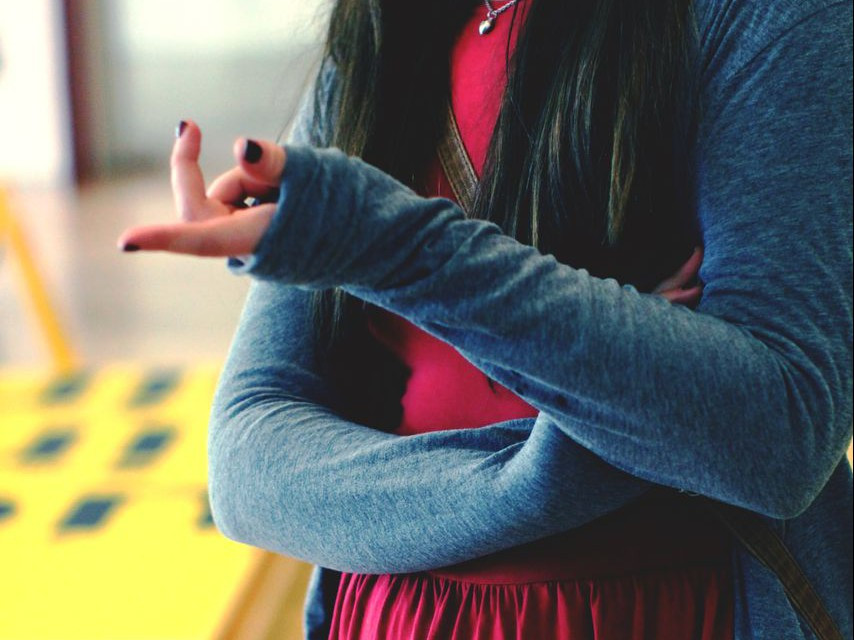 Arms-Crossed-Explaining-Pointing