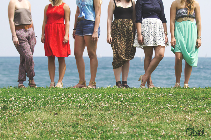 legs of women standing near Lake Michigan in Chicago in the summertime